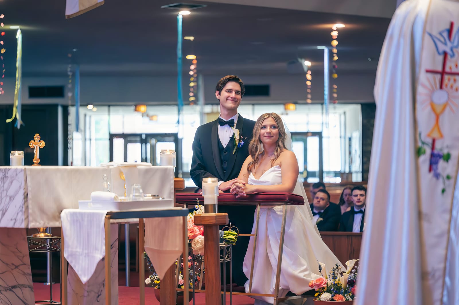 Carol and Eric standing at the altar during their ceremony